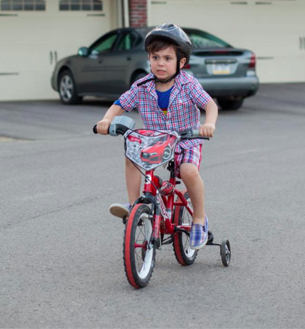 boy riding bike